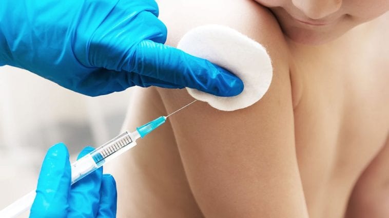 Picture of a small child receiving an inoculation